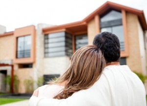 Couple looking at a house